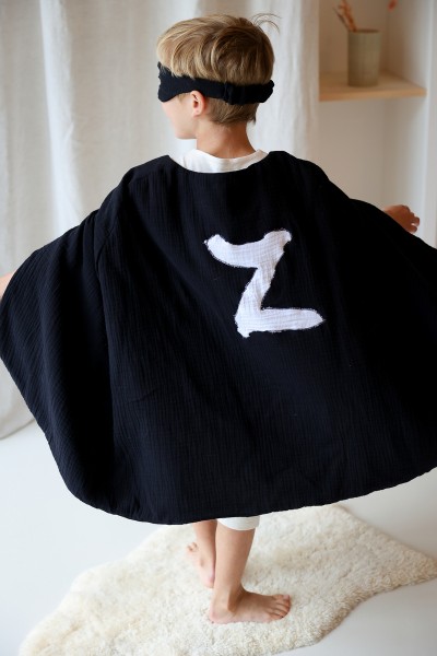 La cape de déguisement