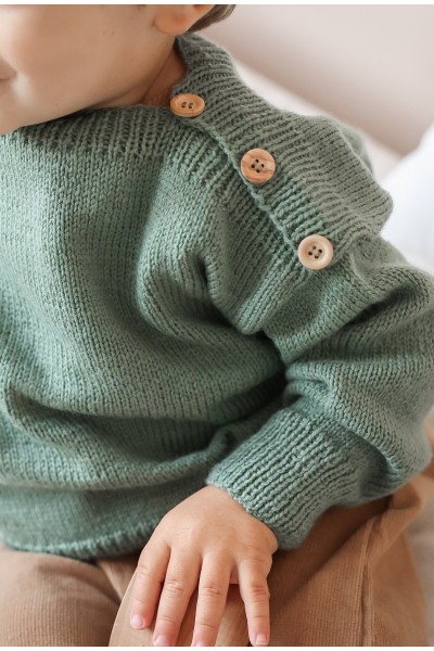 pull avec boutons en bois